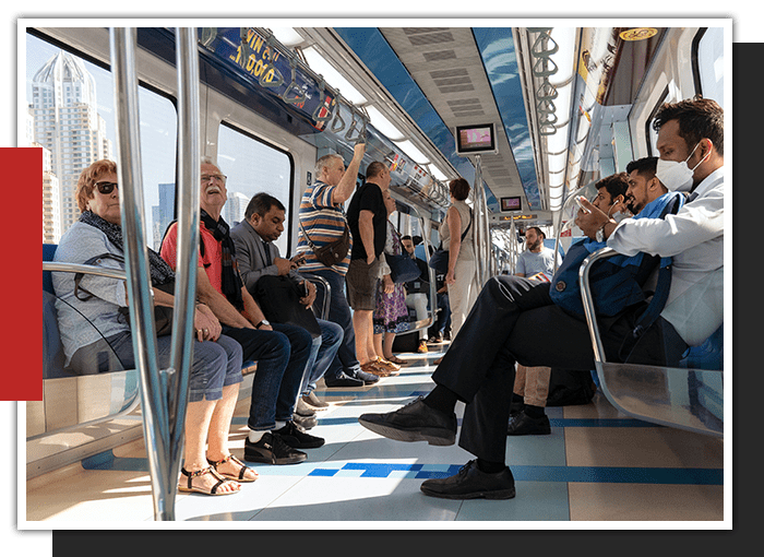 image of people riding public transportation
