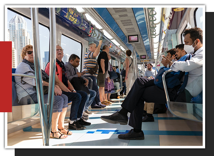Consider Transport Options image of people riding public transportation