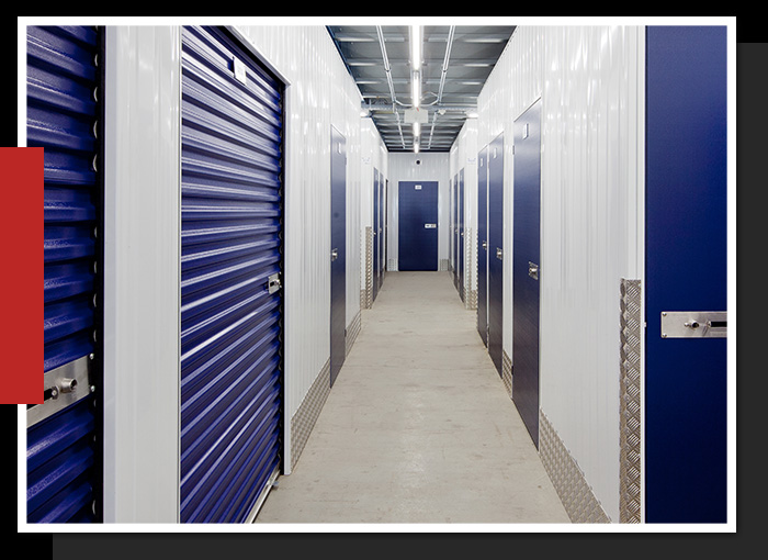 For More Home Space Image of a hallway for a building for storage units