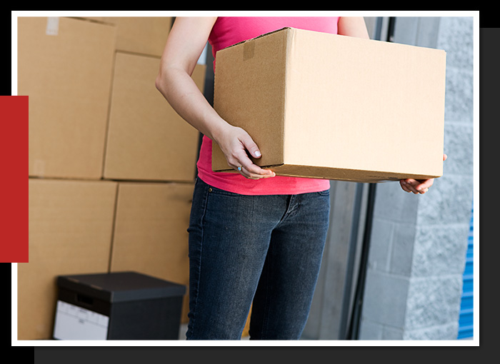 Organization of Business Inventory Image of a small business owner getting inventory from her storage unit