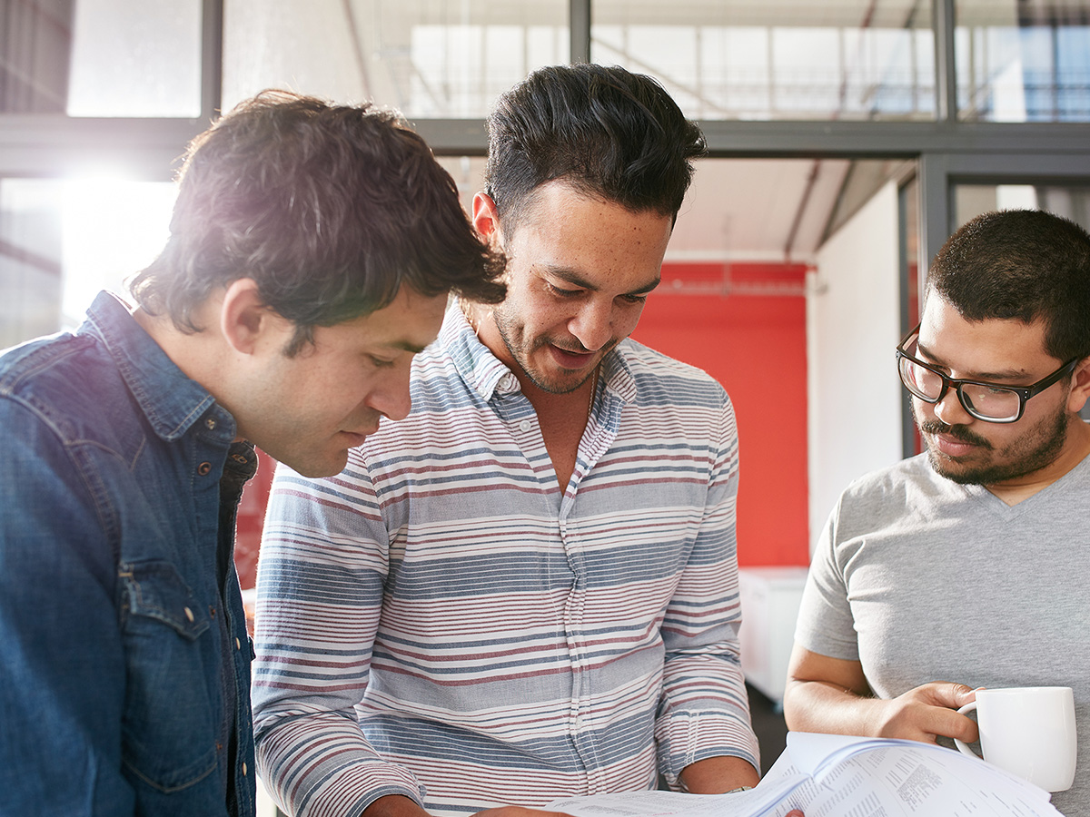 Image of men discussing business