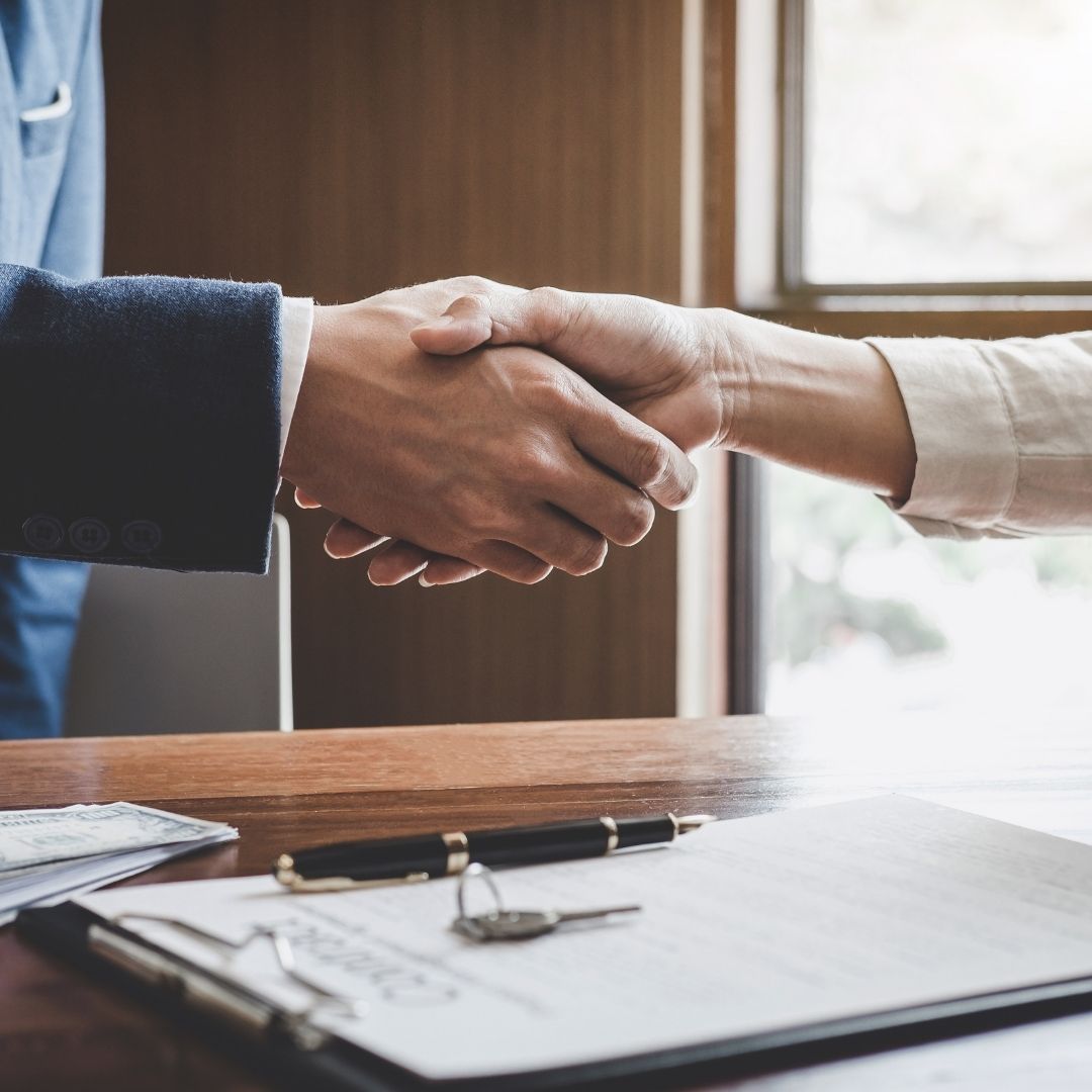 Two people shaking hands